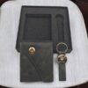 Luxury corporate gift set with green leather Rolex card holder and matching keychain in a black gift box